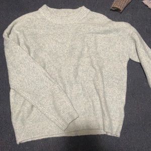 light blue/ tan sweater